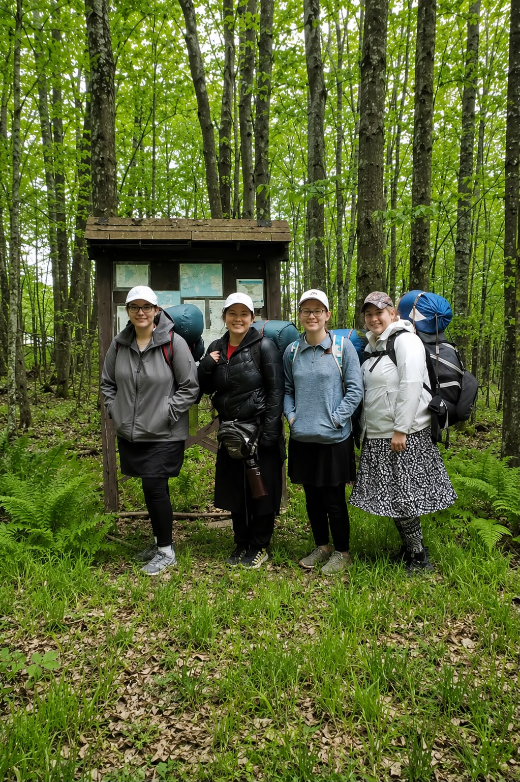 Chadash campers at a Northwoods trailhead, packs on, ready to head in